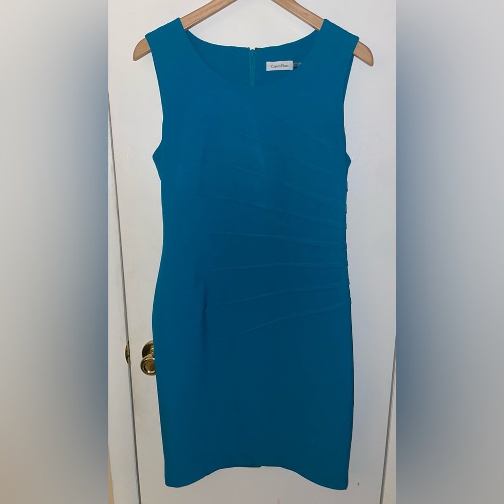 Calvin Klein blue dress.